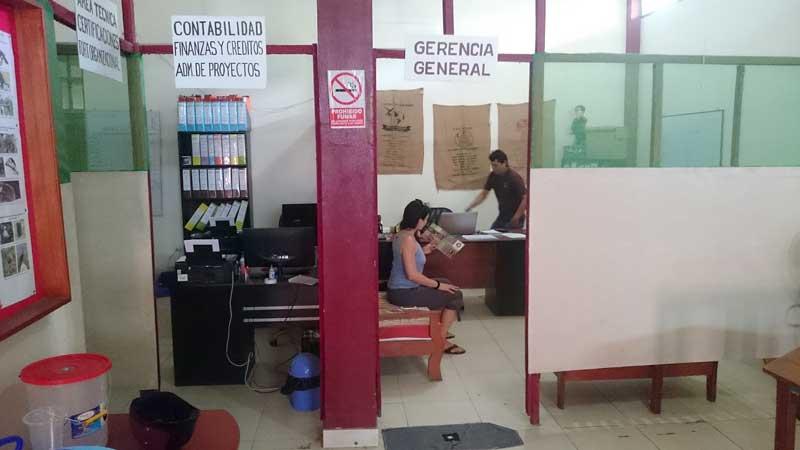 Tereza sits in the admission office.